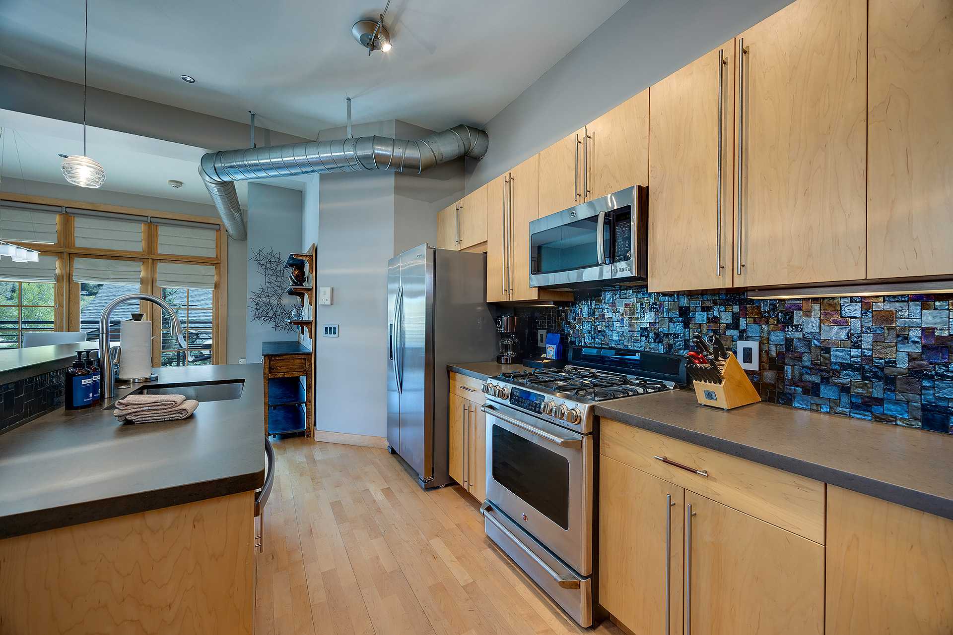 ALP2E: Alpenglow Condominiums
